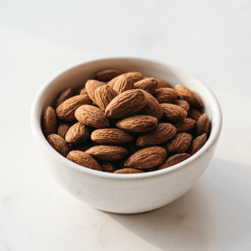 Premium California almonds in white ceramic bowl