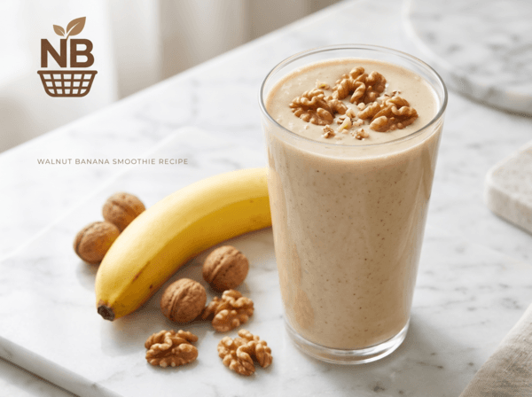 Walnut banana smoothie recipe — creamy brown smoothie in tall glass with walnut garnish